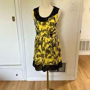 People’s market yellow and black horse dress.